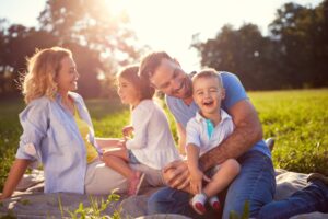 Young family having fun in a park